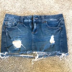 SOLD: Distressed denim mini skirt